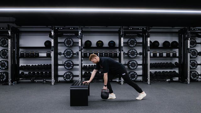 Marchon coach Patrick James demonstrates how to perform a single-arm row with a kettlebell