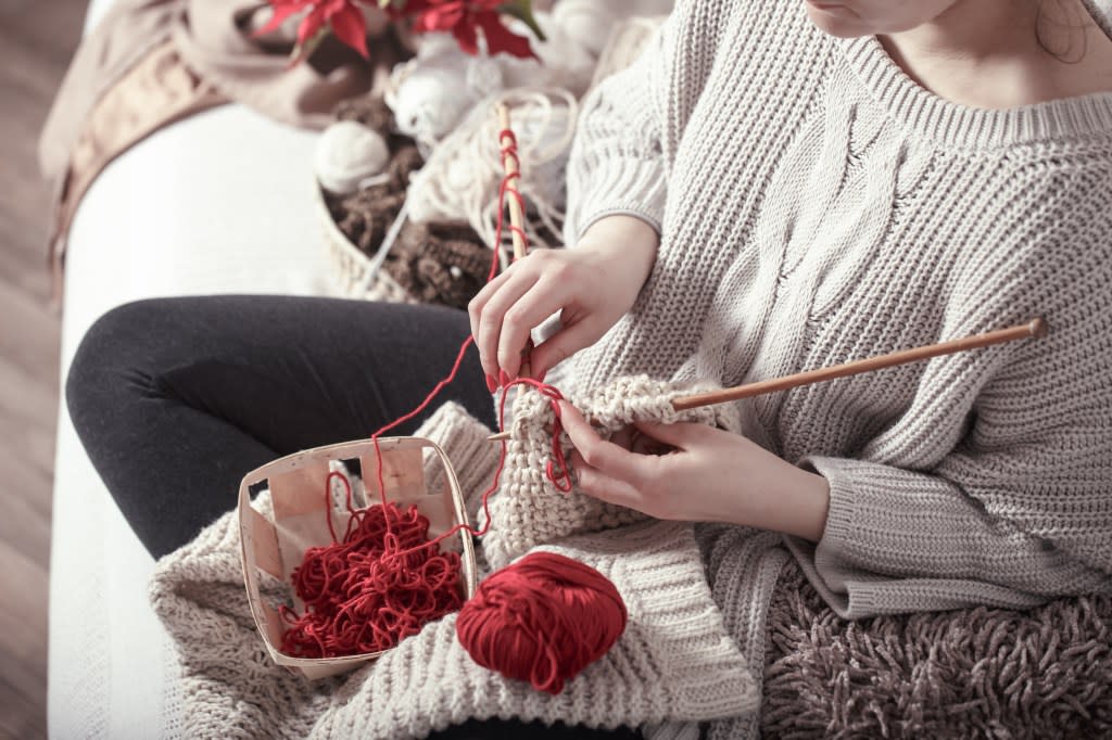 Research has found that engaging in mentally stimulating activities while sitting, such as knitting, may help protect against dementia. puhimec – stock.adobe.com
