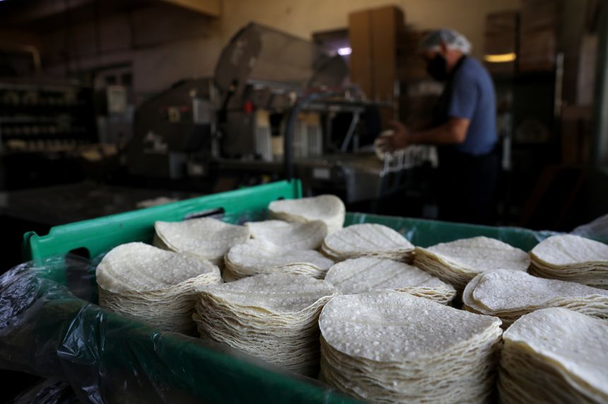 The corn tortillas are housed inside La Gloria Mexican Foods, one of the oldest tortilla factories in the city.