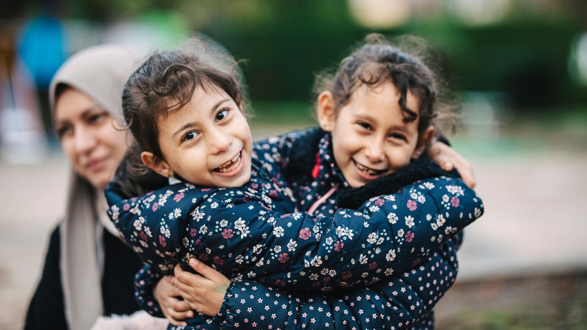 Promoting development including health policies for refugees and migrants