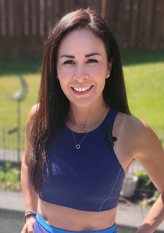 The woman is smiling at the camera