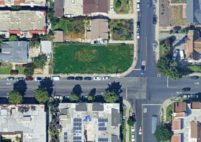 Aerial photo of Koreatown with the empty green lot in the center